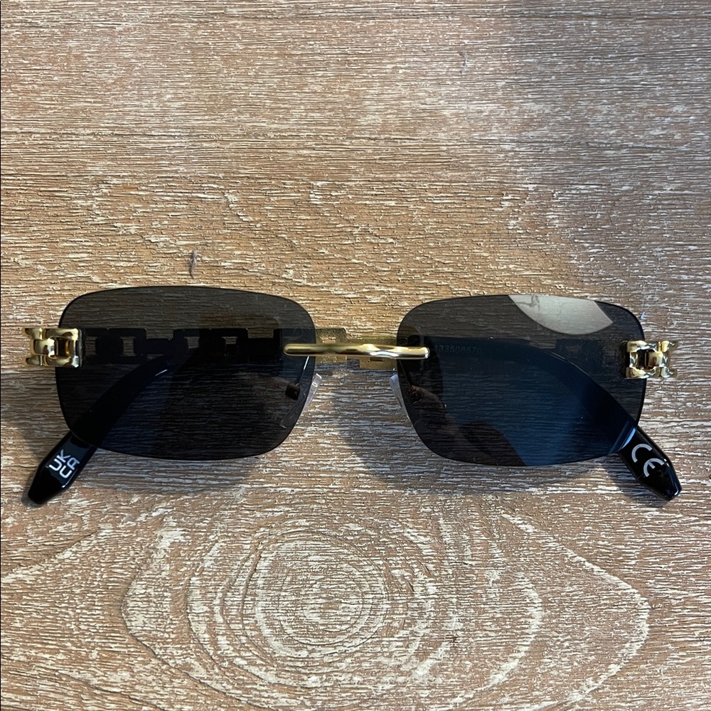 ASOS Gold chain and Black rimless Sunglasses